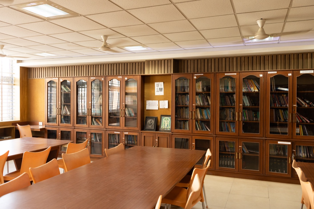 Library reading tables and book cabinets at AECS Maaruti College of Nursing