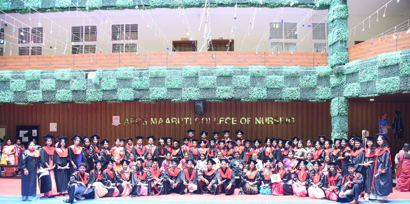 Large student gathering inside the AECS campus atrium