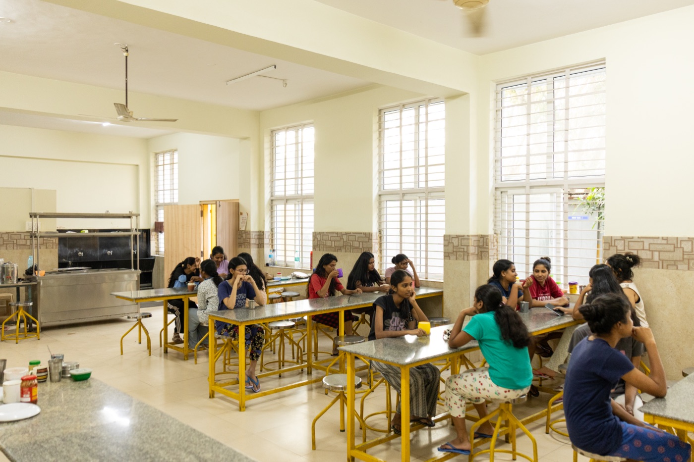 Students seated together in the campus canteen and dining hall