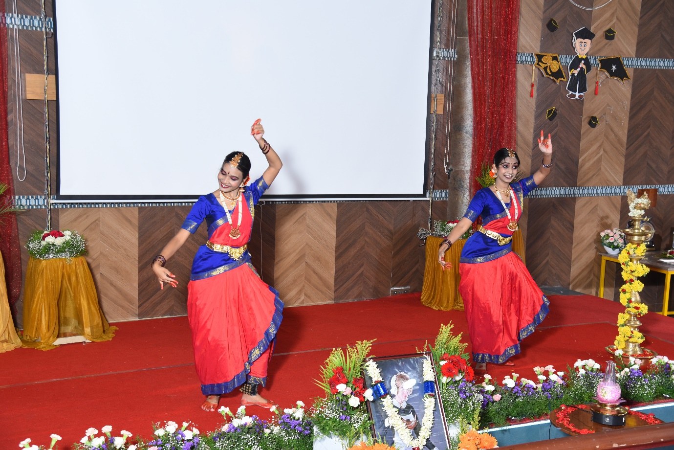 Students performing a classical dance during an AECS campus cultural programme