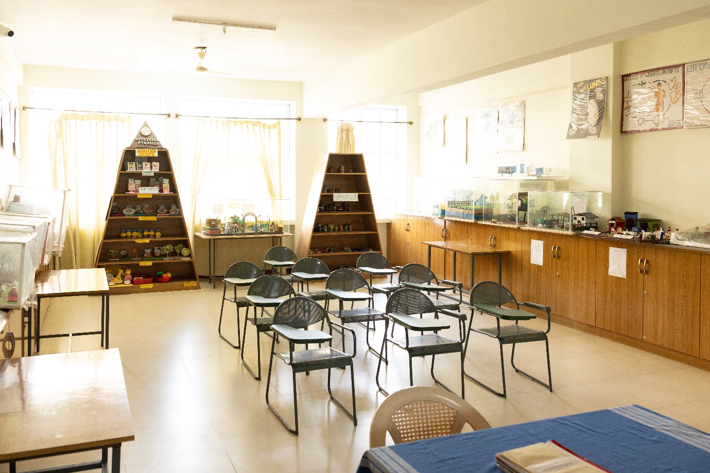 Community health nursing lab with public health charts and teaching displays