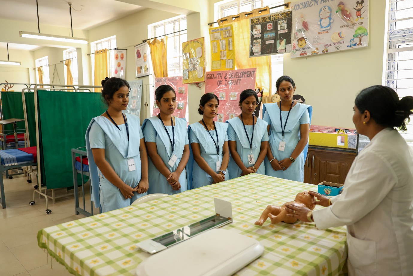 Pediatric nursing lab with child-care learning models and student practice area