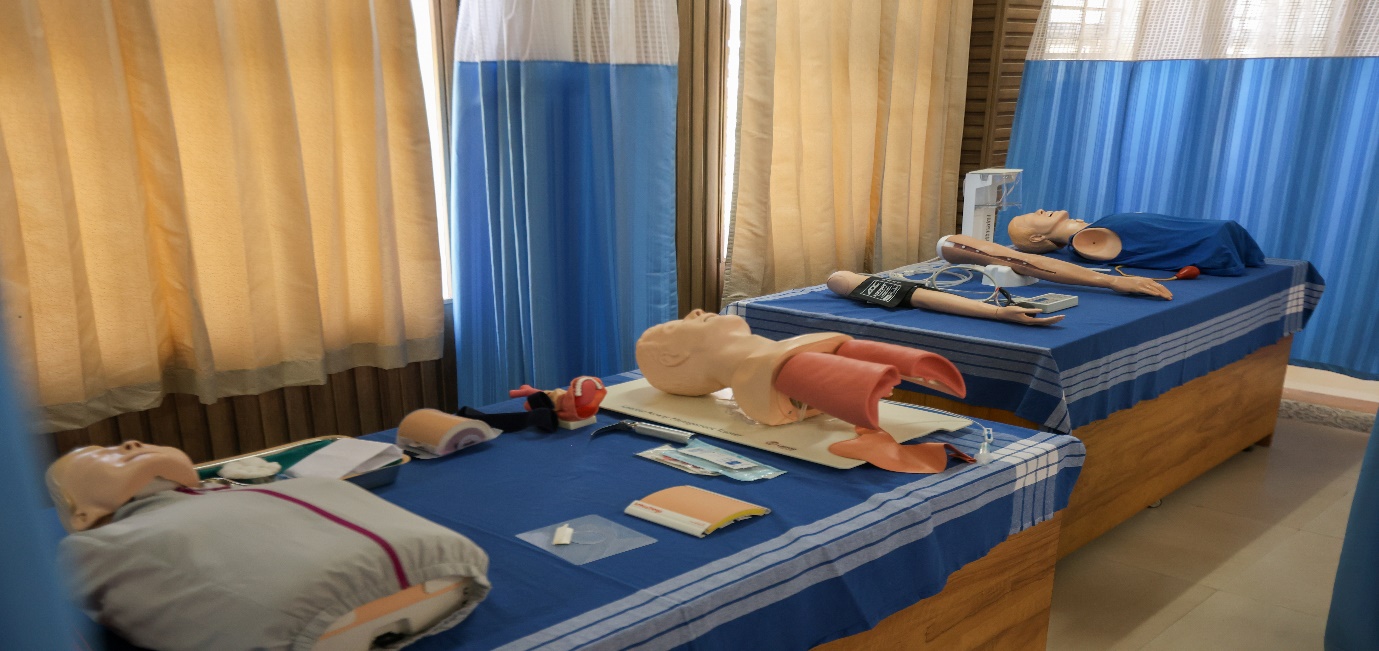 Skill lab equipment arranged for supervised nursing procedure practice