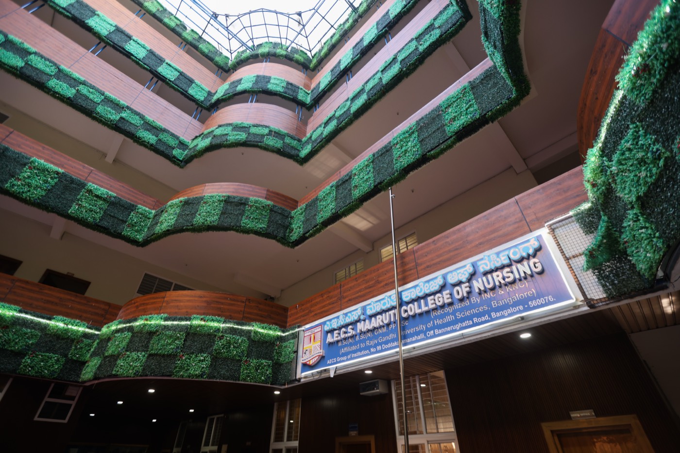Main campus atrium and college signage at AECS Maaruti College of Nursing